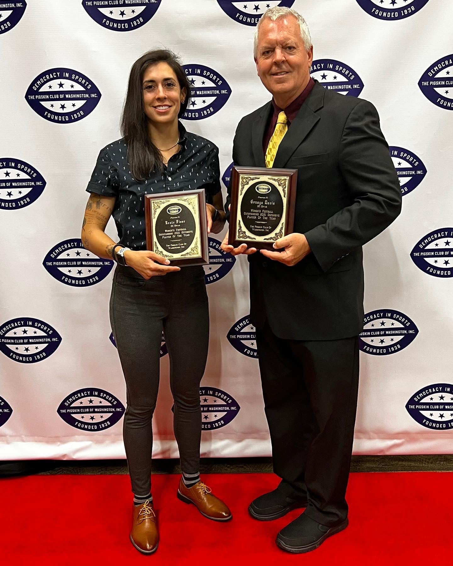 Protagonist clothing apparel founder accepting award for football 