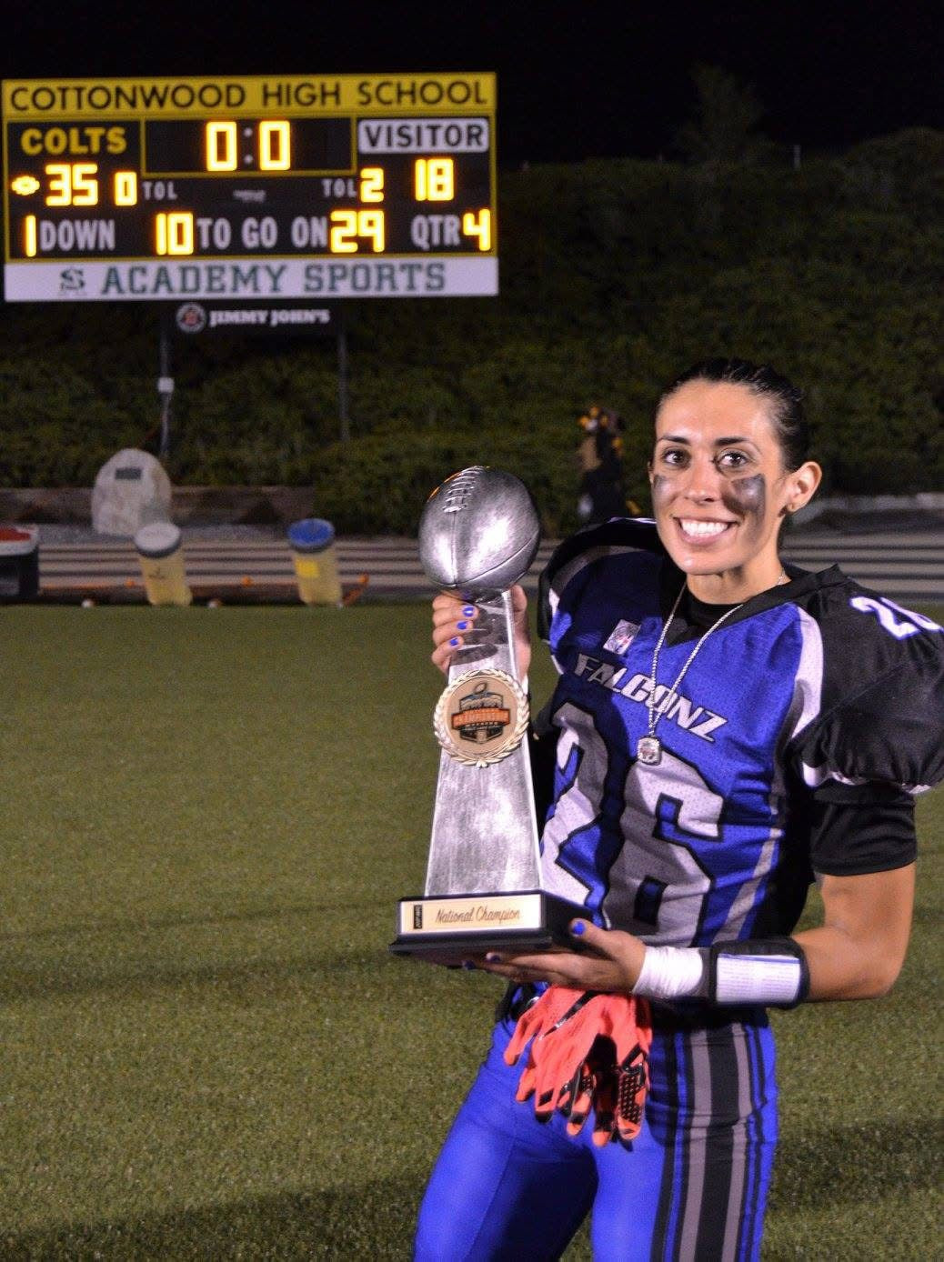 Protagonist apparel clothing founder showing trophy after championship game in Utah