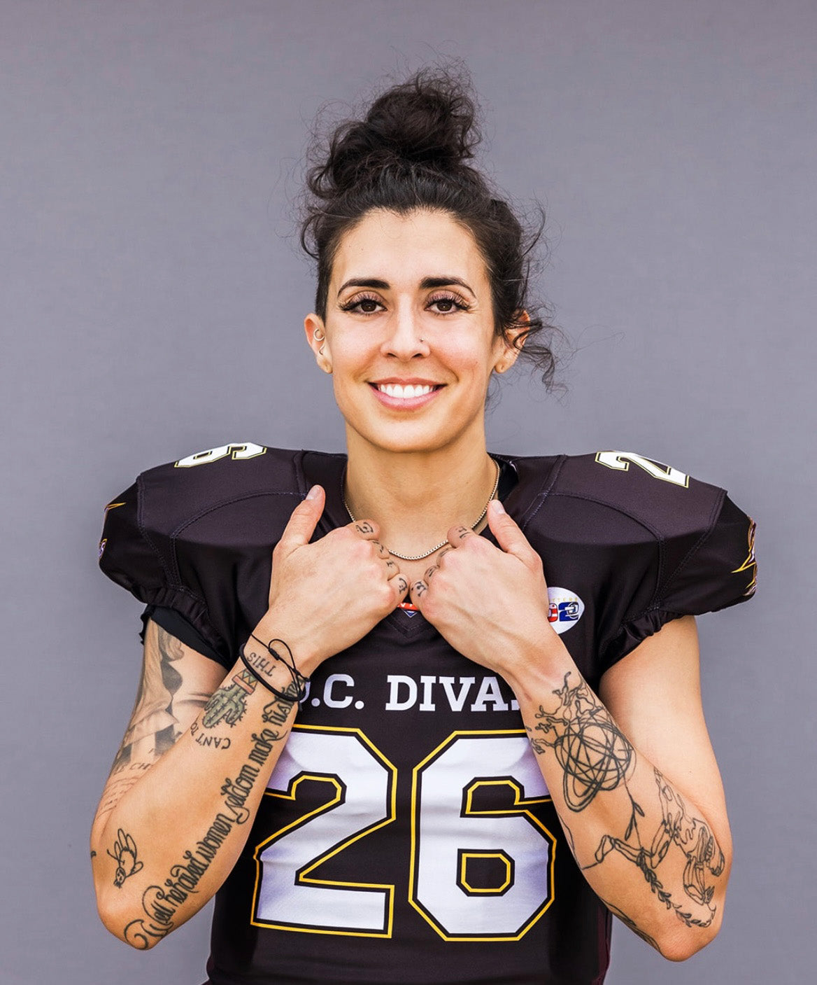 protagonist apparel clothing shop founder football owner in pads. protagonist founder