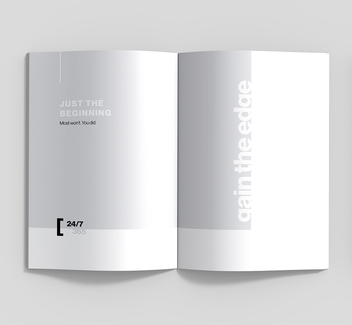 Open book with text and branding on a light gray background