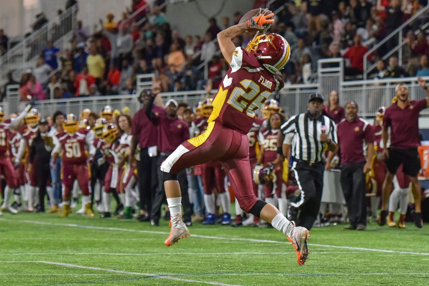 Protagonist apparel clothing founder playing for the DC Divas making amazing touch down catch